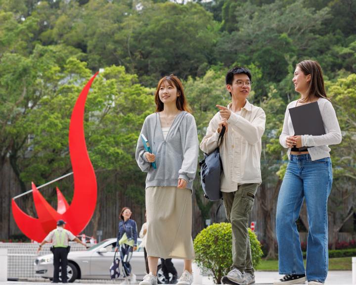 people walking infront of redbird